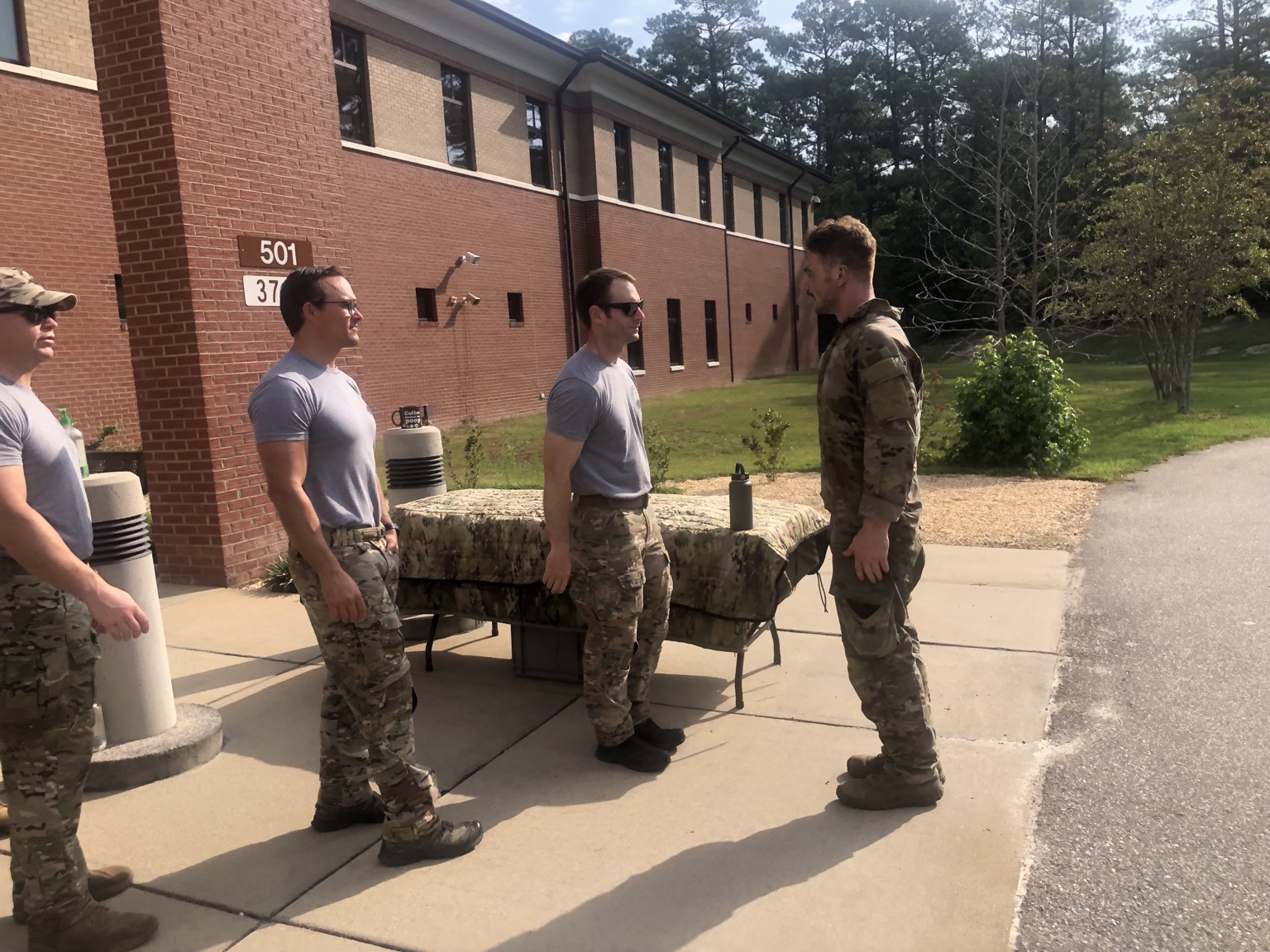 Bobby Saunders with instructors during Air Force Special Warfare training
